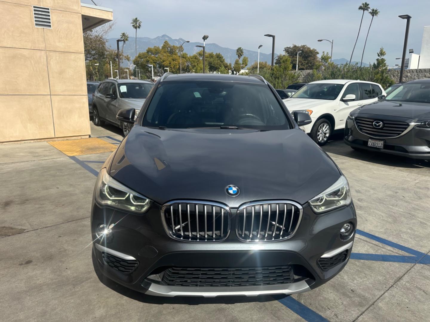 2016 Gray /Black BMW X1 leather (WBXHT3Z34G4) with an 4 CYLINDER engine, Automatic transmission, located at 30 S. Berkeley Avenue, Pasadena, CA, 91107, (626) 248-7567, 34.145447, -118.109398 - Crown City Motors is a used “Buy Here Pay Here” car dealer in Pasadena CA. “Buy Here Pay Here” financing, means that when you purchase your vehicle from our dealership, that you make the payments to the dealership as well. We do not need the banks approval to get you approved for a used auto - Photo#8